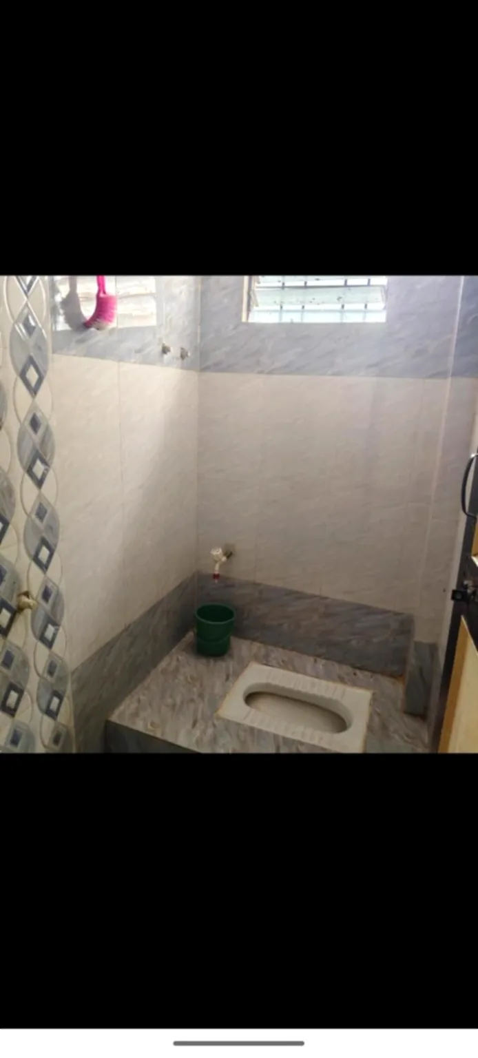 Attached bathroom at Atithi Niwas Jejuri room
